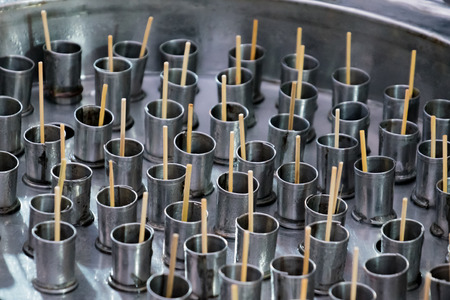 Ancient ice cream With hot weather ,Ancient ice cream need to use hand rotation and salt.texture of steel container to Manufacturing ice cream, Thailand.の写真素材