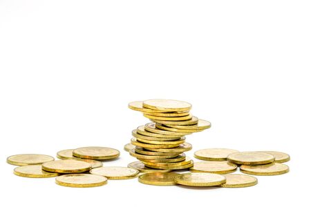 Gold coins stack isolated on white backgroundの写真素材