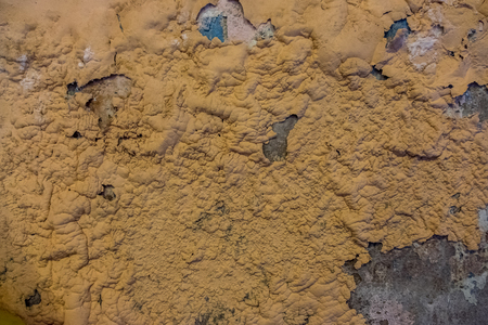 The color on wall peeling caused by waterの写真素材