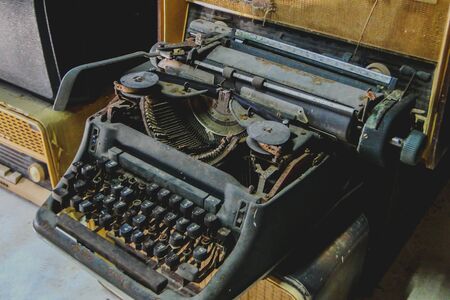Old black retro mechanical typewriter machine.の写真素材