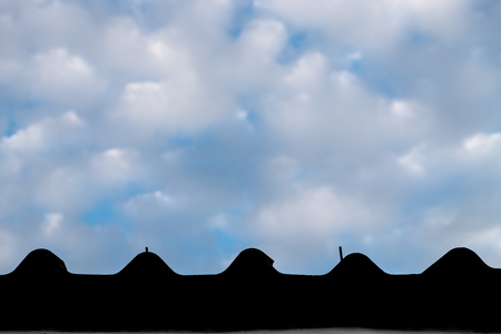 Blue sky and white cloud and end of roof. Sunny day selective focus cloud.の写真素材