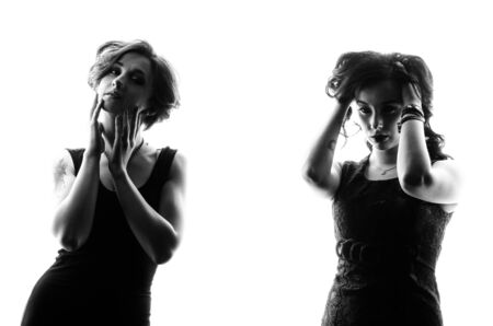 two sexy girls isolate on whiteの写真素材