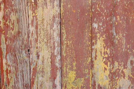 Cracked paint on a wooden door. Grunge style backgroundの写真素材