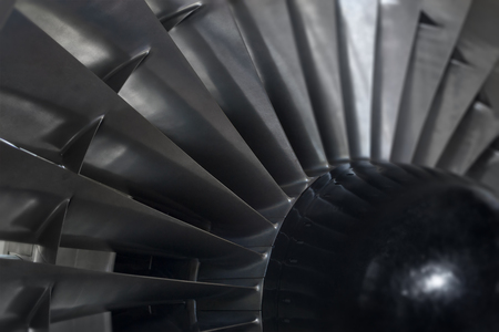 Close-up view on jet turbine of a turbojet engine の写真素材