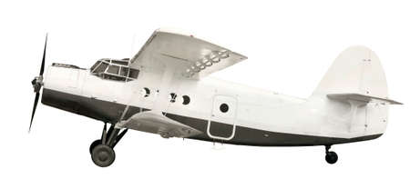 Side view of white airplane biplane with piston engine and propeller. Isolated on white background