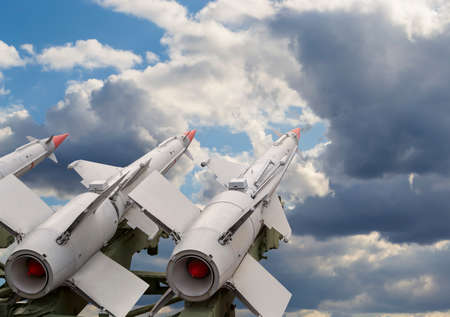 Anti aircraft air defense missiles on the launcher against the background of a cloudy skyの写真素材