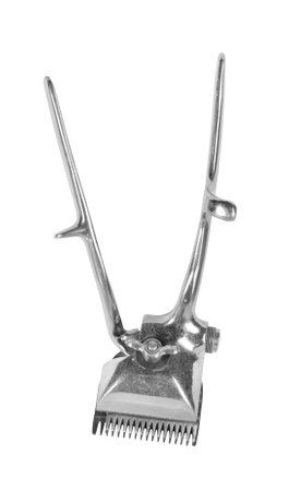 Old manual hair clipper. Isolated on white background