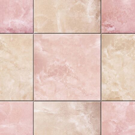 seamless natural pink and beige marble tiled texture backgroundの写真素材