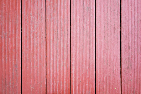 Texture of clean colored red wooden fenceの写真素材