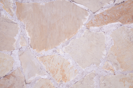 Old ancient stone wall texture; outdoor backgroundの写真素材