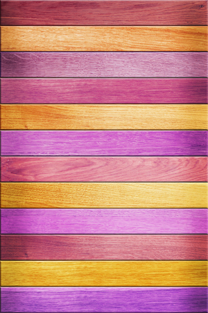 The grunge texture of colored wooden fenceの写真素材