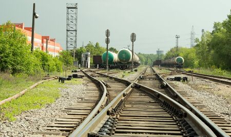 railway arrow, wagons and tanks are on the roads