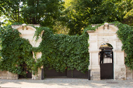 old stone entrance with iron gates. Moscow. Russiaの写真素材