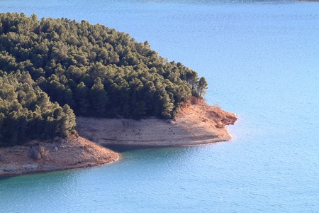 dam line with blue bright waterの写真素材