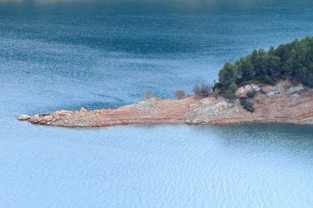 dam line with blue bright waterの写真素材