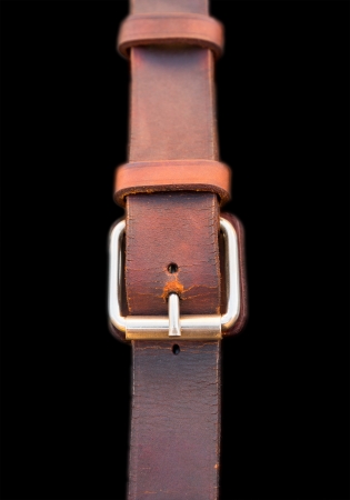 Leather belt on blackの写真素材