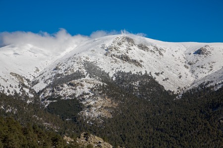 Snowy mountains and "bola del mundo" in Navacerrada, Madrid, Spainの写真素材
