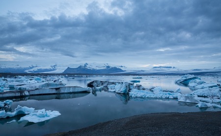 Wide view of blue icebergs floating in Jokulsarlon glacial lagoon, Iceland
