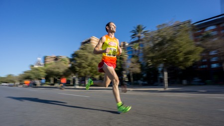 Marathon runner ultra wide angle side viewのeditorial素材