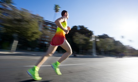 Marathon runner ultra wide angle rear viewの写真素材