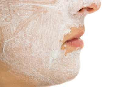 Woman chin and lips with mudpack, profile viewの写真素材