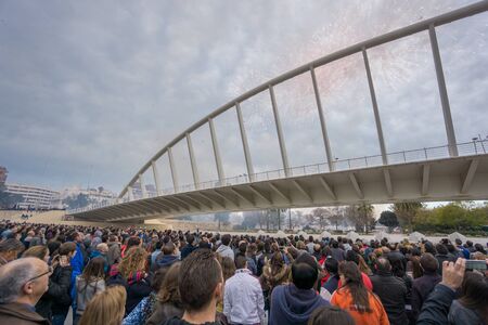 VALENCIA - FEB 28: Unidentified people enjoy the Macro-Mascleta in the old river bank in Valencia on February 28, 2015 in Valencia, Spain. The Macro-Mascleta fires 3500kg of gunpowderのeditorial素材