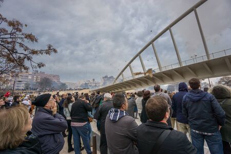 VALENCIA - FEB 28: Unidentified people enjoy the Macro-Mascleta in the old river bank in Valencia on February 28, 2015 in Valencia, Spain. The Macro-Mascleta fires 3500kg of gunpowderのeditorial素材