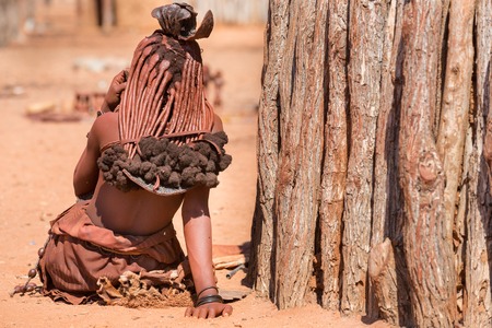 Rear view of himba woman outside shackの写真素材