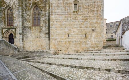 Cloudy day in Trujillo with paved street and stone stairs, Spainの写真素材