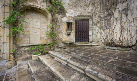 Wide angle view of stone floor, staircase and facade in Trujillo, Spainの写真素材