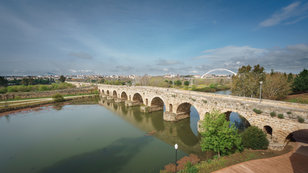 Wide angle view of Roman bridge over Guadiana river in Merida, Spainの写真素材