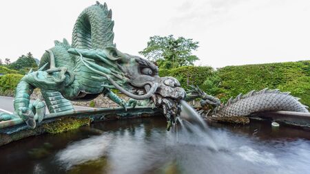 Dragon fountain with waterの写真素材