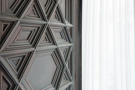 Decorated black wooden window frameの写真素材