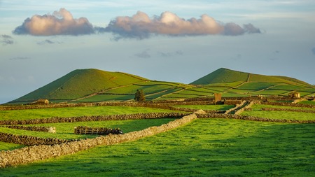 Farm fields double hill in the Terceira island in Azoresの写真素材