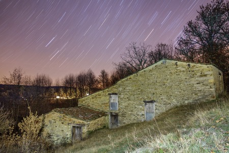 Star trail and old watermillの写真素材