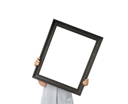 Woman hands holding black empty frameの写真素材