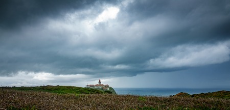 Cabo da Roca Lighthouse under the storm, wide angleの写真素材