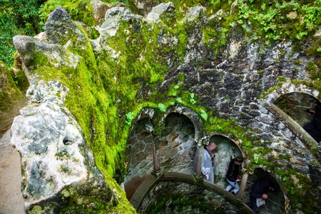 The Initiation Well pattern with blurred tourists in Sintraの写真素材