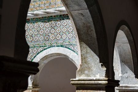 Vintage colorful tile wall and archesの写真素材