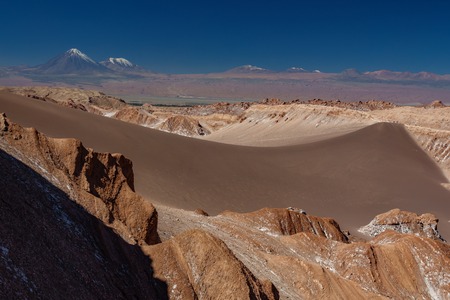 Great dune and Licancabur volcano in Atacamaの写真素材