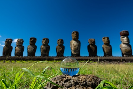Ahu Tongariki Moais and crystal ball against deep blue skyの写真素材