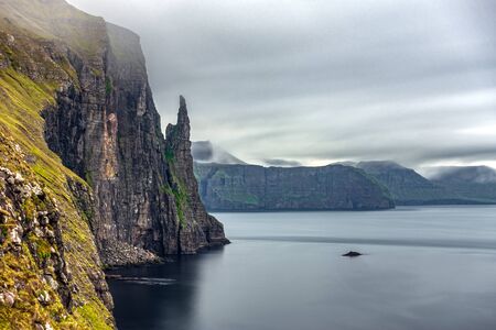 Long exposure of Trollkonufingur, Witchs Finger detail in Faroe Islandsの写真素材