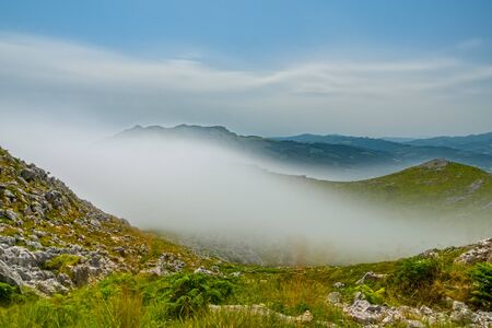 Ultra long exposure of mist over the mountainの写真素材