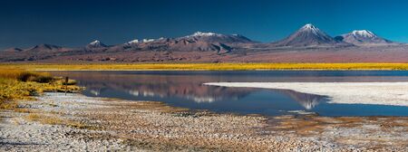 Cejar lagoon and volcano peaks in the backgroundの写真素材