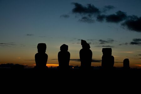 Moai platform silhouette at dusk in easter islandの写真素材