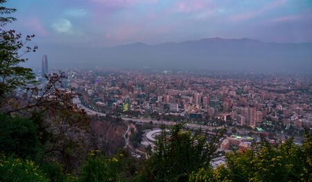 Dusk over Santiago de Chile capital with misty weatherの写真素材