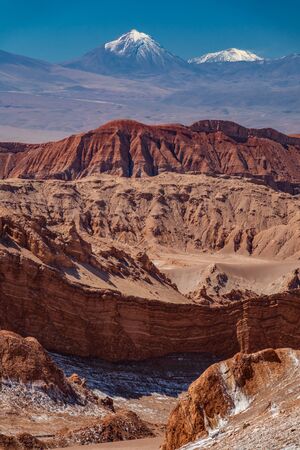 Amphitheater in Moon valley and Licancabur volcanoの写真素材