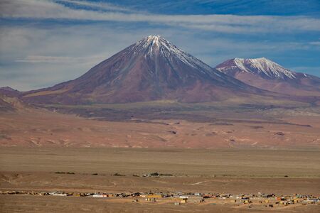 Licancabur mountain volcano peak with san pedro de Atacamaの写真素材