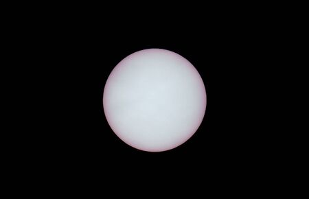 Detailed view of sun with sunspots and black skyの写真素材