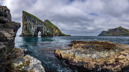 Gigapan panorama bottom view of the amazing Drangarnir gate in front of Tindholmur, Faroe Islands, Denmark.の写真素材